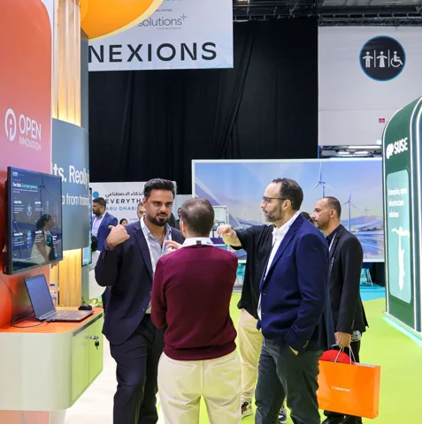 In conversation at the Open Innovation AI stand.